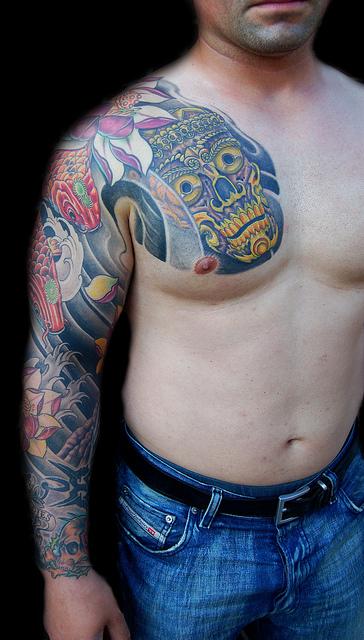 Tattoo uploaded by Tattoodo • New shells with incredible healed chest and  stomach by Javier Betancourt #javierbetancourt #traditional #blackwork  #scorpion #shells #snakes #dragon #Tibetan #Buddha #fire #flower  #tattoooftheday • Tattoodo