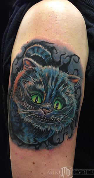 8 Cheshire Cat Tattoo Designs