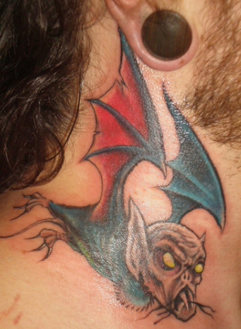Bat neck tattoo by Edith Fluet at Blue Bloof Custom Tattoos in Ottawa, ON.  : r/tattoos