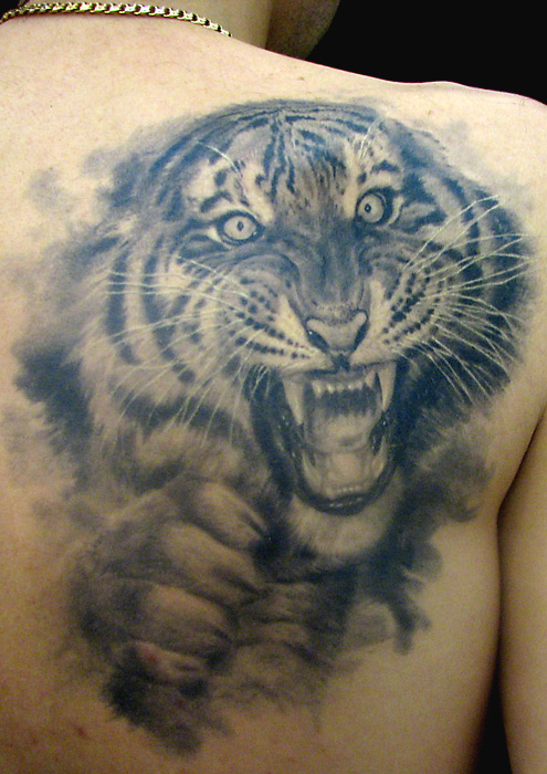 tiger face tattoos on back